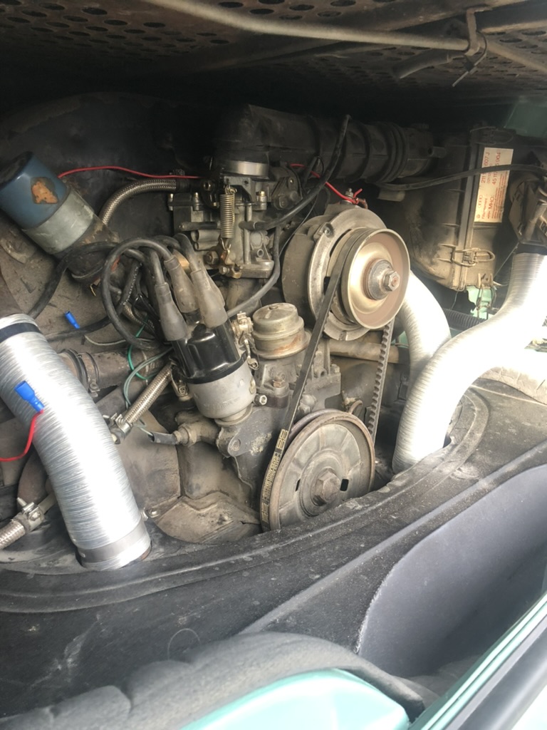 Rusty and oily VW engine with corroded oil cooler seal