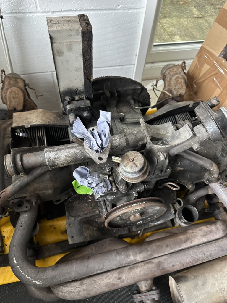 VW engine with tinware, fan housing, carb and alternator removed