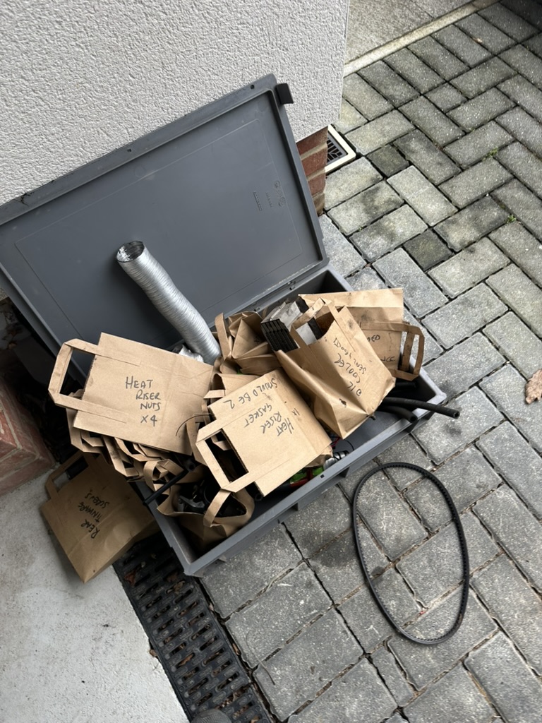 Labelled bags of nuts, bolts and washers from VW engine