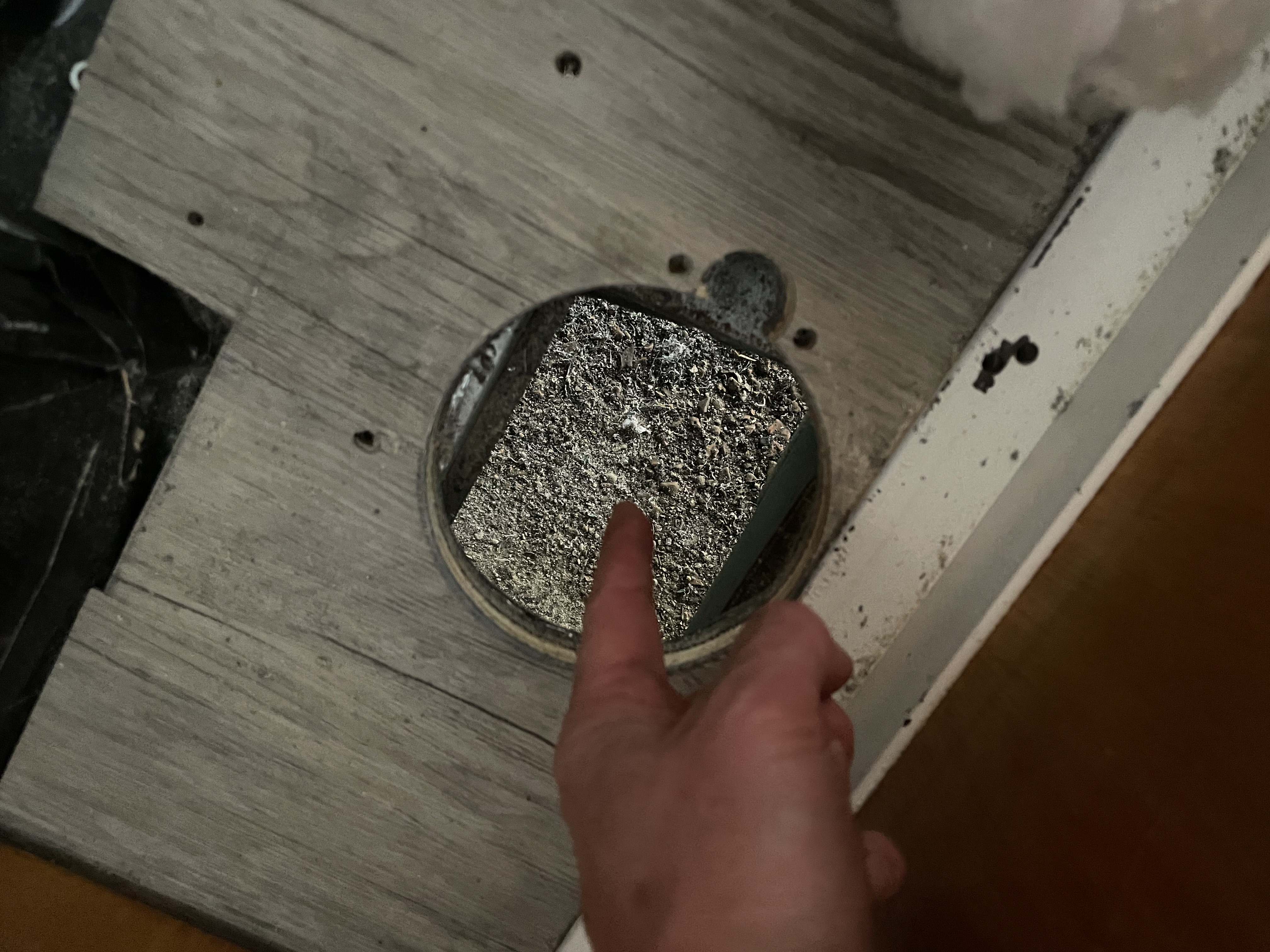 Hole cut in the floor for the exhaust