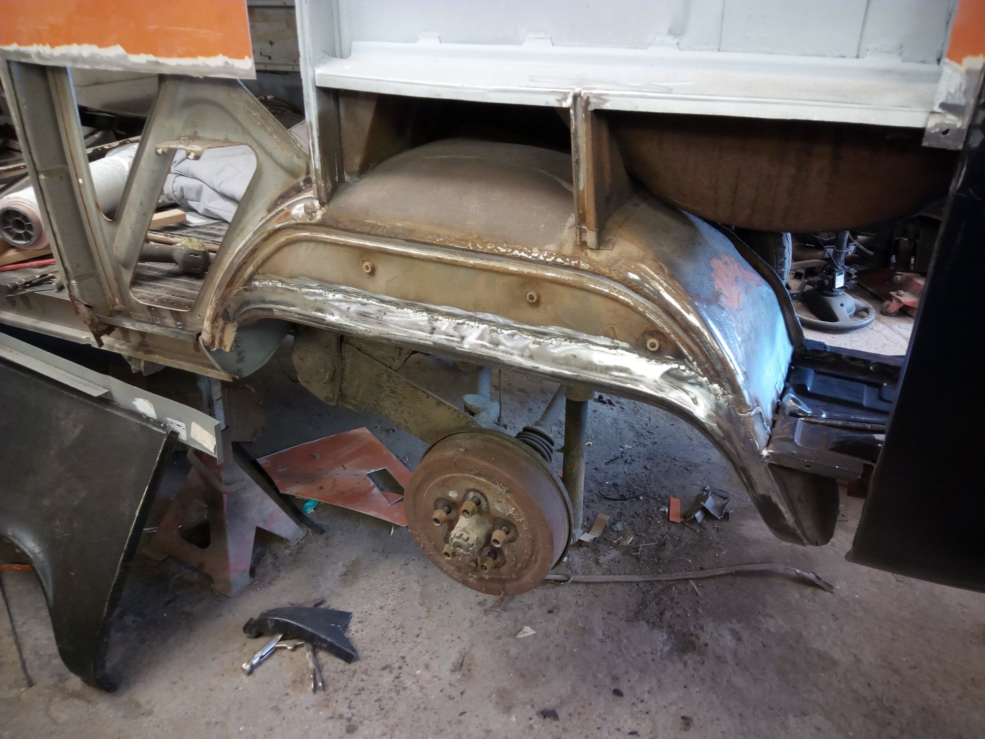 Rusty wheel arch being cut away