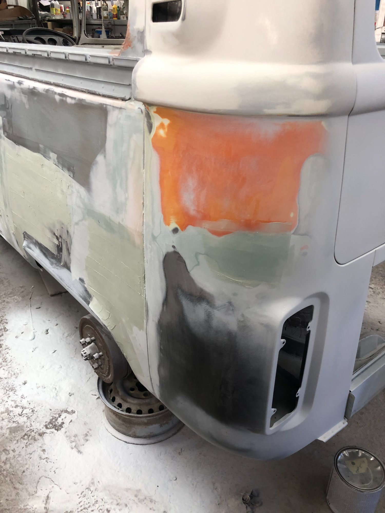 Rear corners now solid metal with primer and paint samples